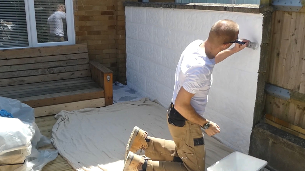 Painting a masonry wall